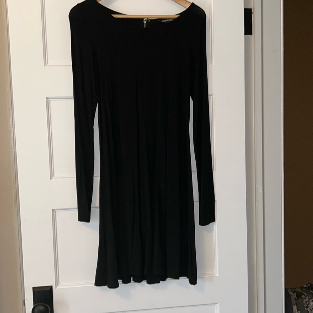 Black dress. Size medium.  Flared sits below the knee.